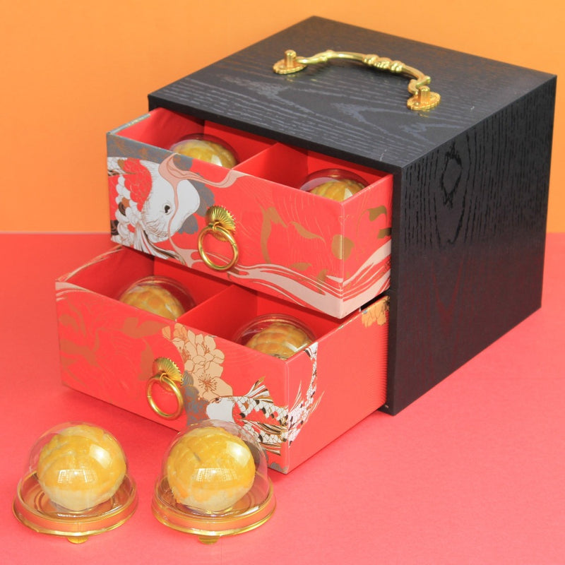 8pcs of handmade Rocher Shanghai Mooncake in a solid square wooden box designed with a bright red double layered pull out shelf with 4 Mooncakes in each layer